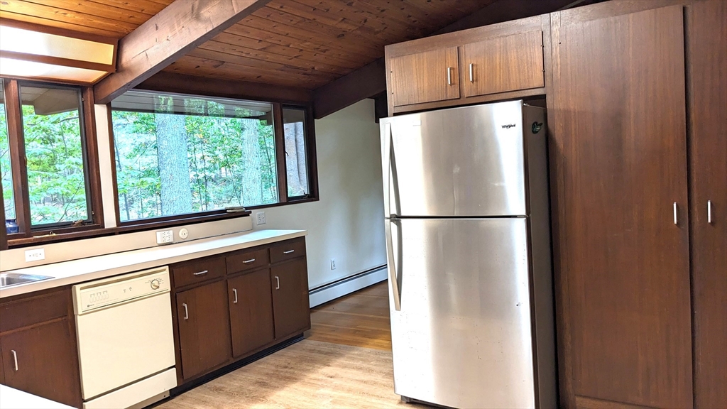 41 Belvedere Road Boxford, MA 01921 - Photo 4 of 16 a kitchen with stainless steel appliances granite countertop a refrigerator and a sink