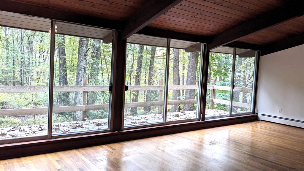 41 Belvedere Road Boxford, MA 01921 - Photo 8 of 16 a view of a large window with wooden floor