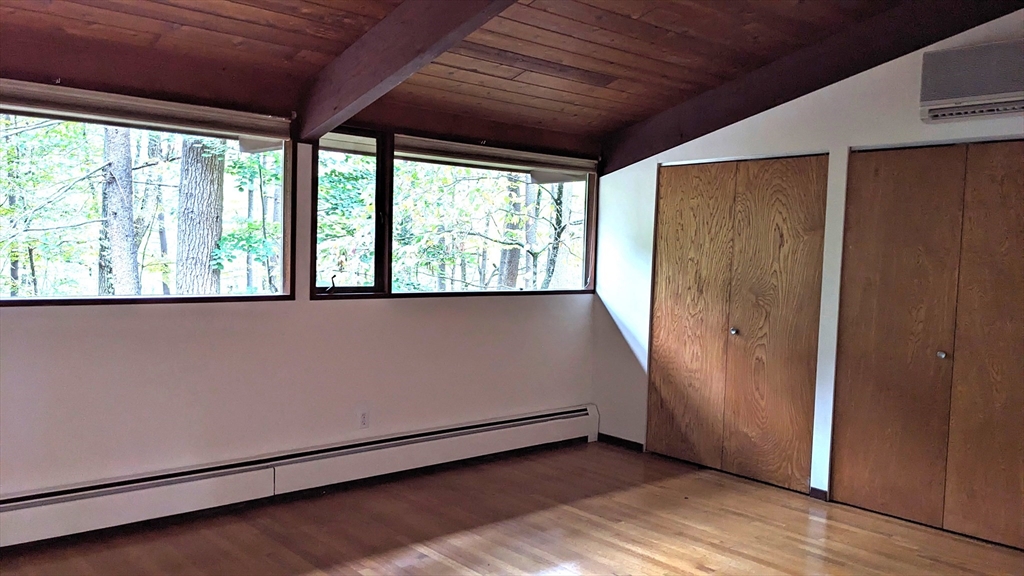 41 Belvedere Road Boxford, MA 01921 - Photo 10 of 16 a view of a room with wooden floor and doors
