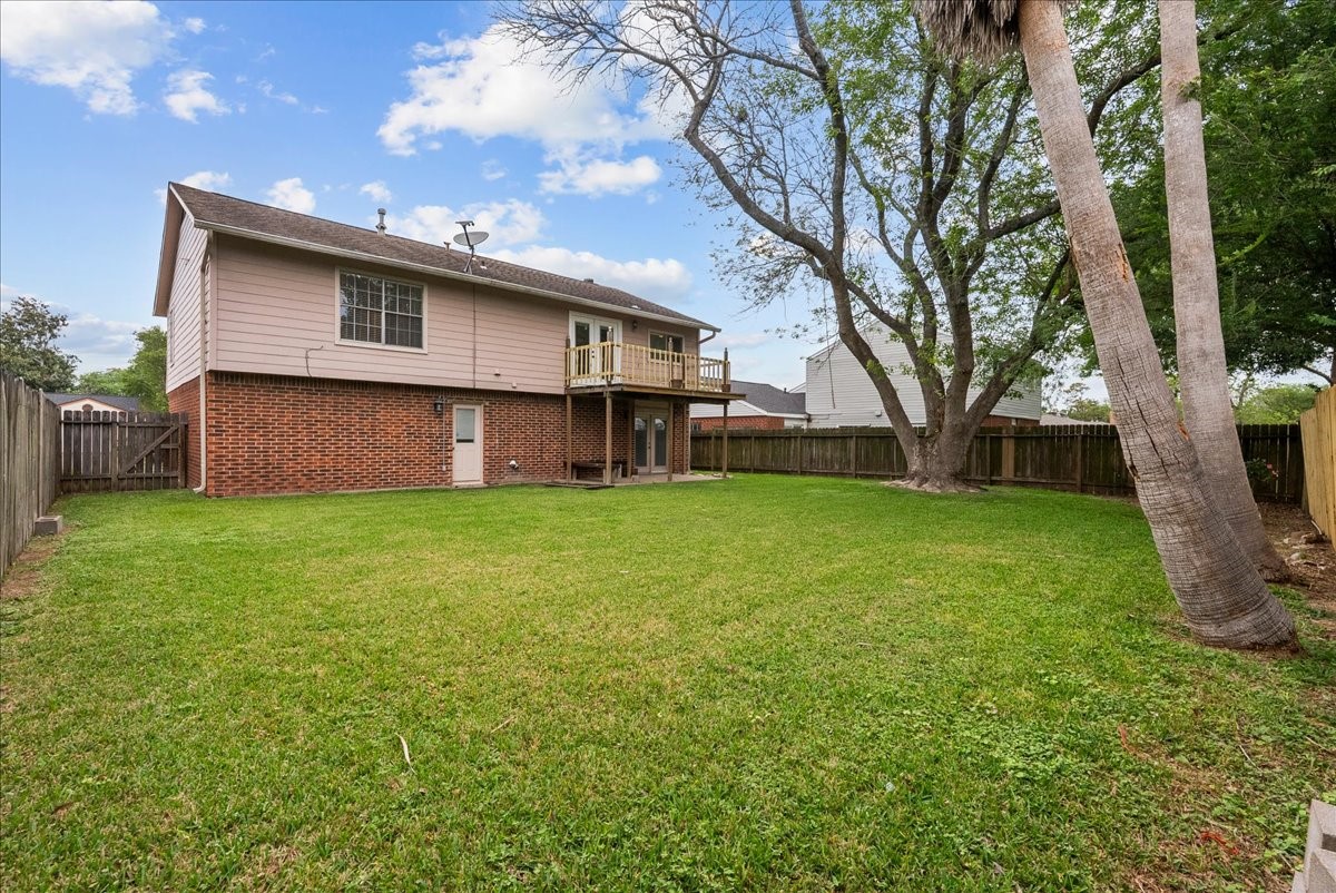 430 Redway Lane Houston, TX 77598 - Photo 33 of 43 a view of a house with a yard