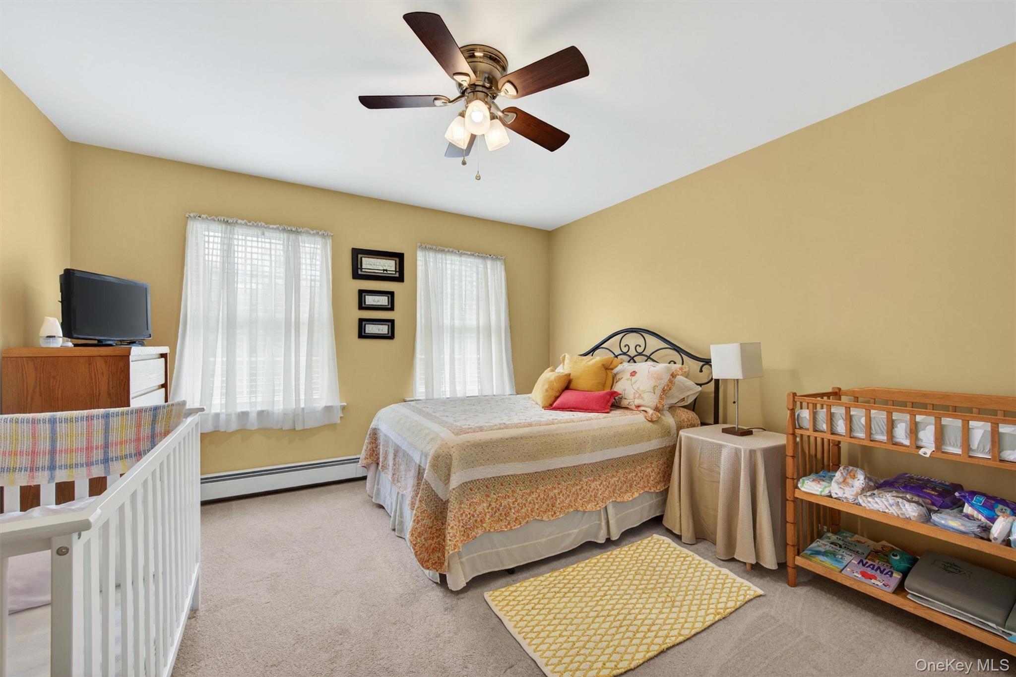19 Pirog Road Pine Bush, NY 12566 - Photo 29 of 50 a bedroom with a bed and a window