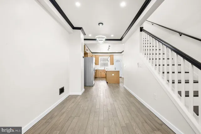 a view of entryway with wooden floor
