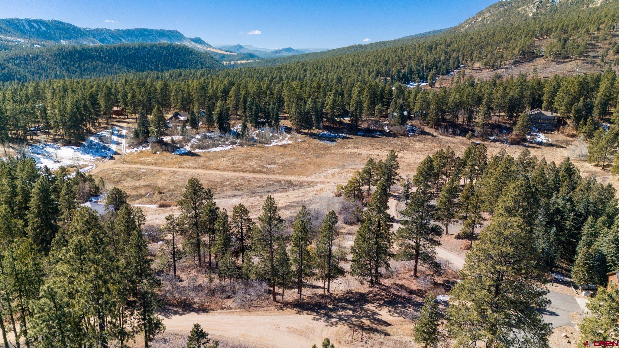 1101 Los Ranchitos Drive Durango, CO 81301 - Photo 1 of 13 a view of a lake with a mountain