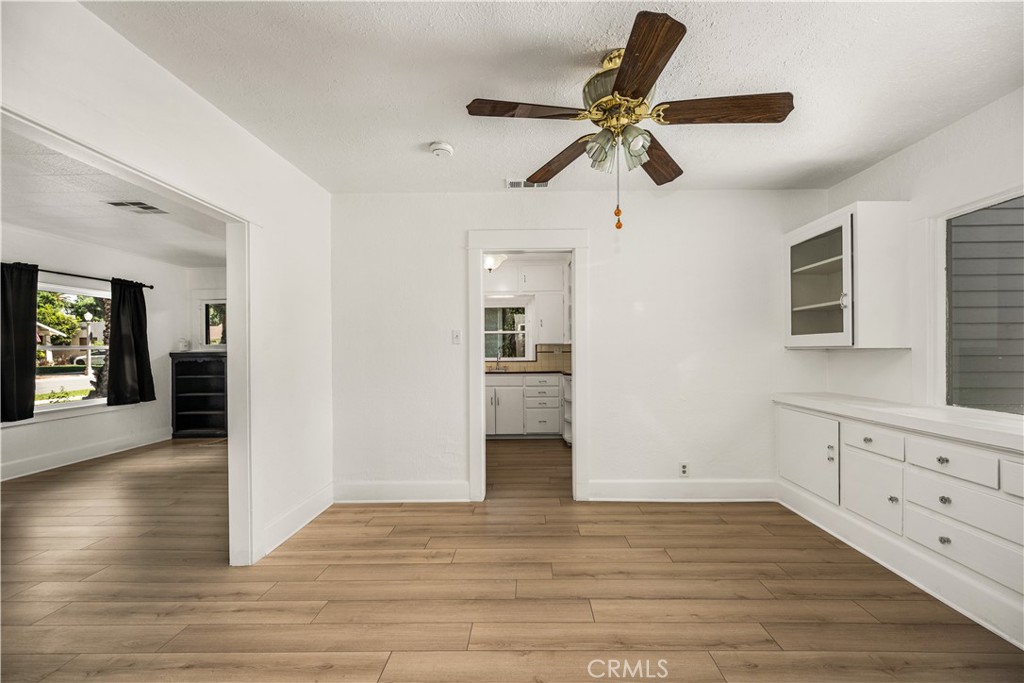 3980 Linwood Place Riverside, CA 92506 - Photo 12 of 41 flow view of dining area to living room and kitchen