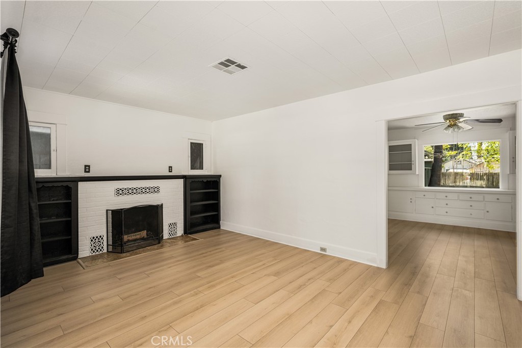 3980 Linwood Place Riverside, CA 92506 - Photo 4 of 41 Built-in bookcase, and fireplace