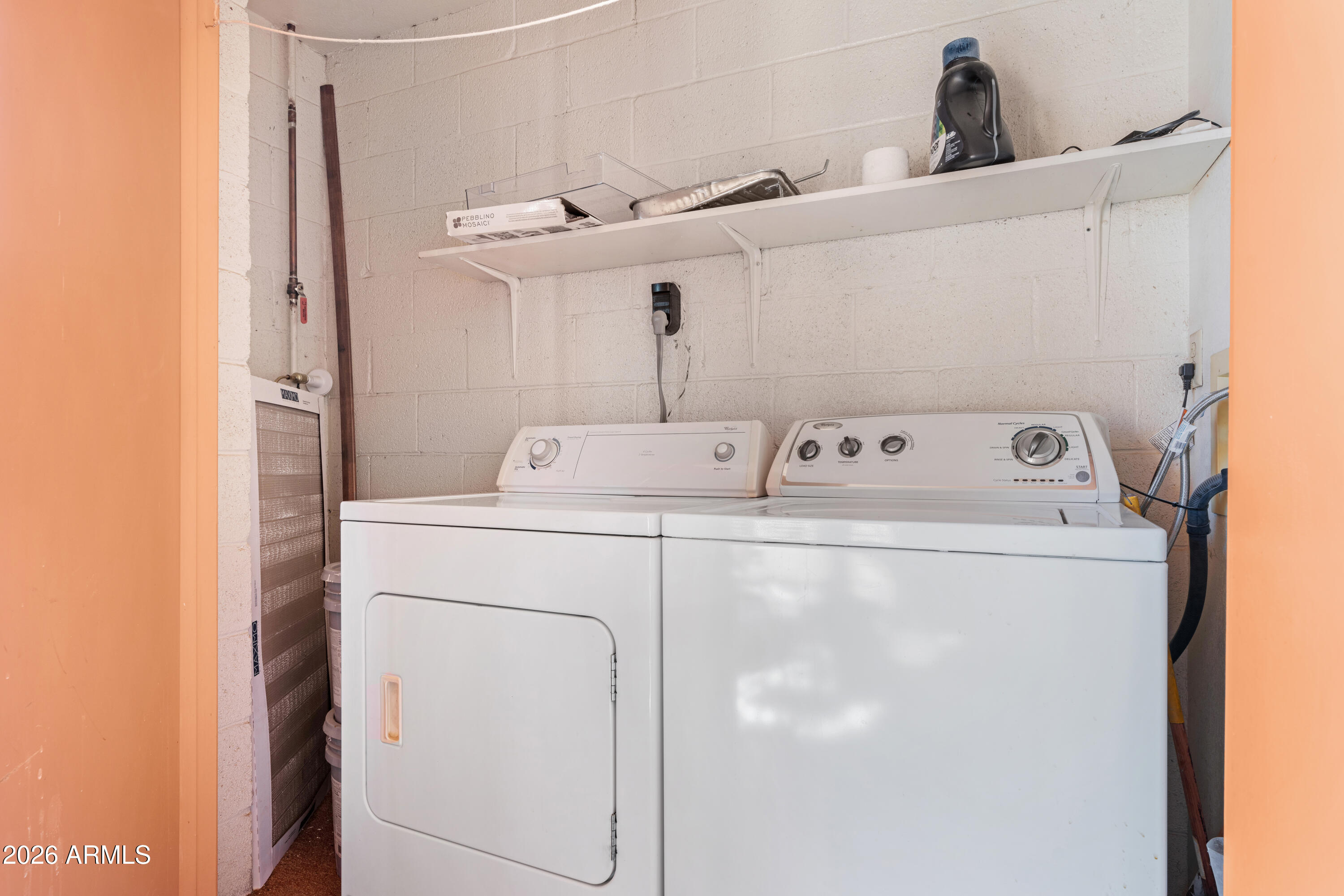 4303 East Cactus Road, Unit 410 Phoenix, AZ 85032 - Photo 30 of 50 a utility room with dryer and washer