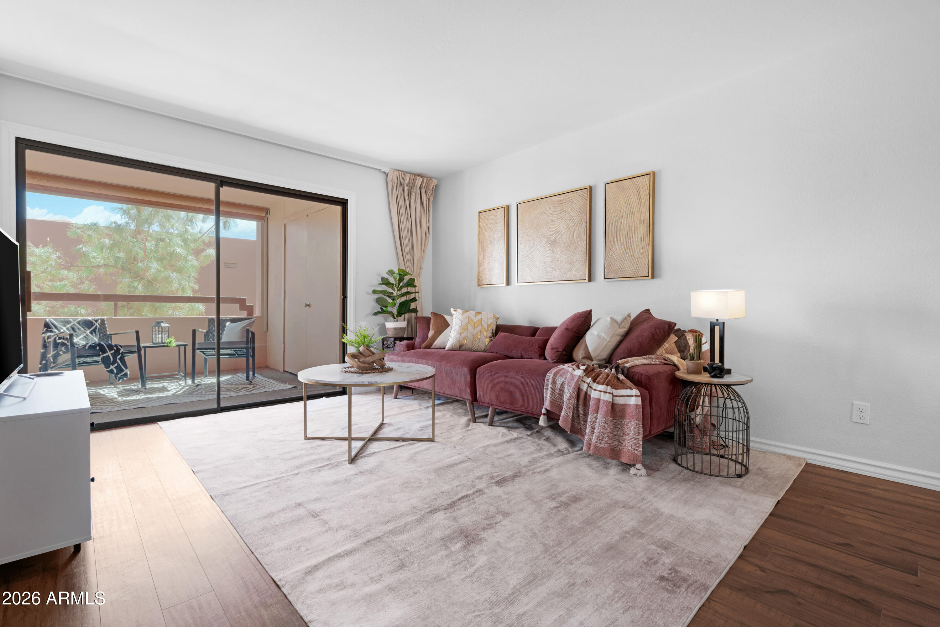 4303 East Cactus Road, Unit 410 Phoenix, AZ 85032 - Photo 3 of 50 a living room with furniture and a large window