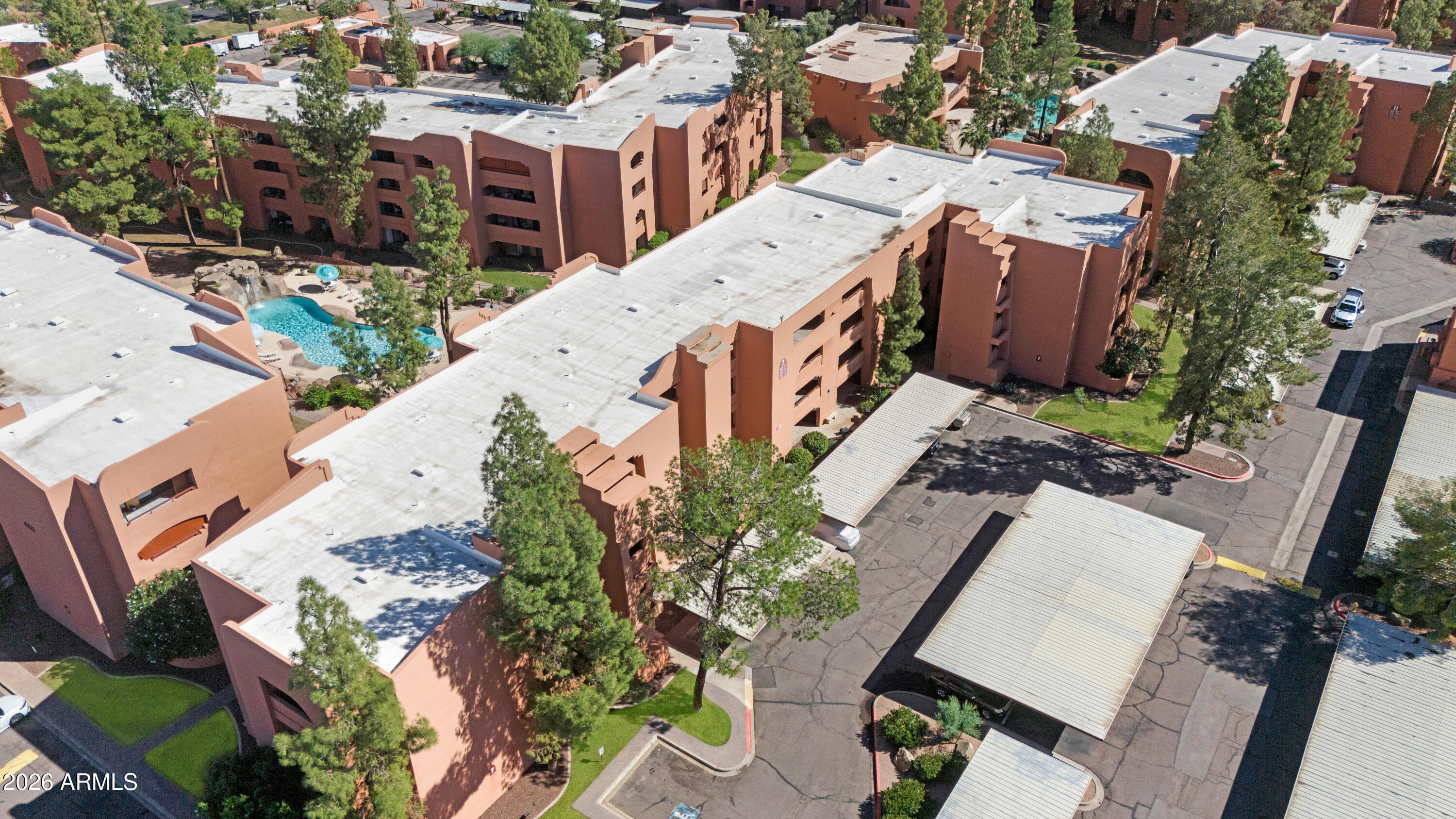 4303 East Cactus Road, Unit 410 Phoenix, AZ 85032 - Photo 35 of 50 an aerial view of a house with outdoor space