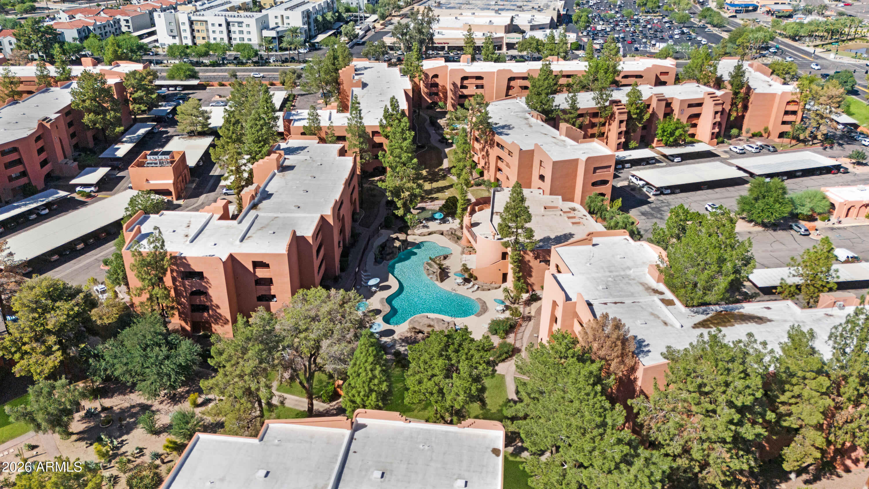 4303 East Cactus Road, Unit 410 Phoenix, AZ 85032 - Photo 46 of 50 an aerial view of residential houses with outdoor space