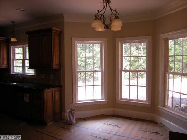 7311 Lee's Ridge Road Oak Ridge, NC 27310 - Photo 10 of 11 Other. Breakfast room. Note the end panels on the cabinetry. Every detail thought of!