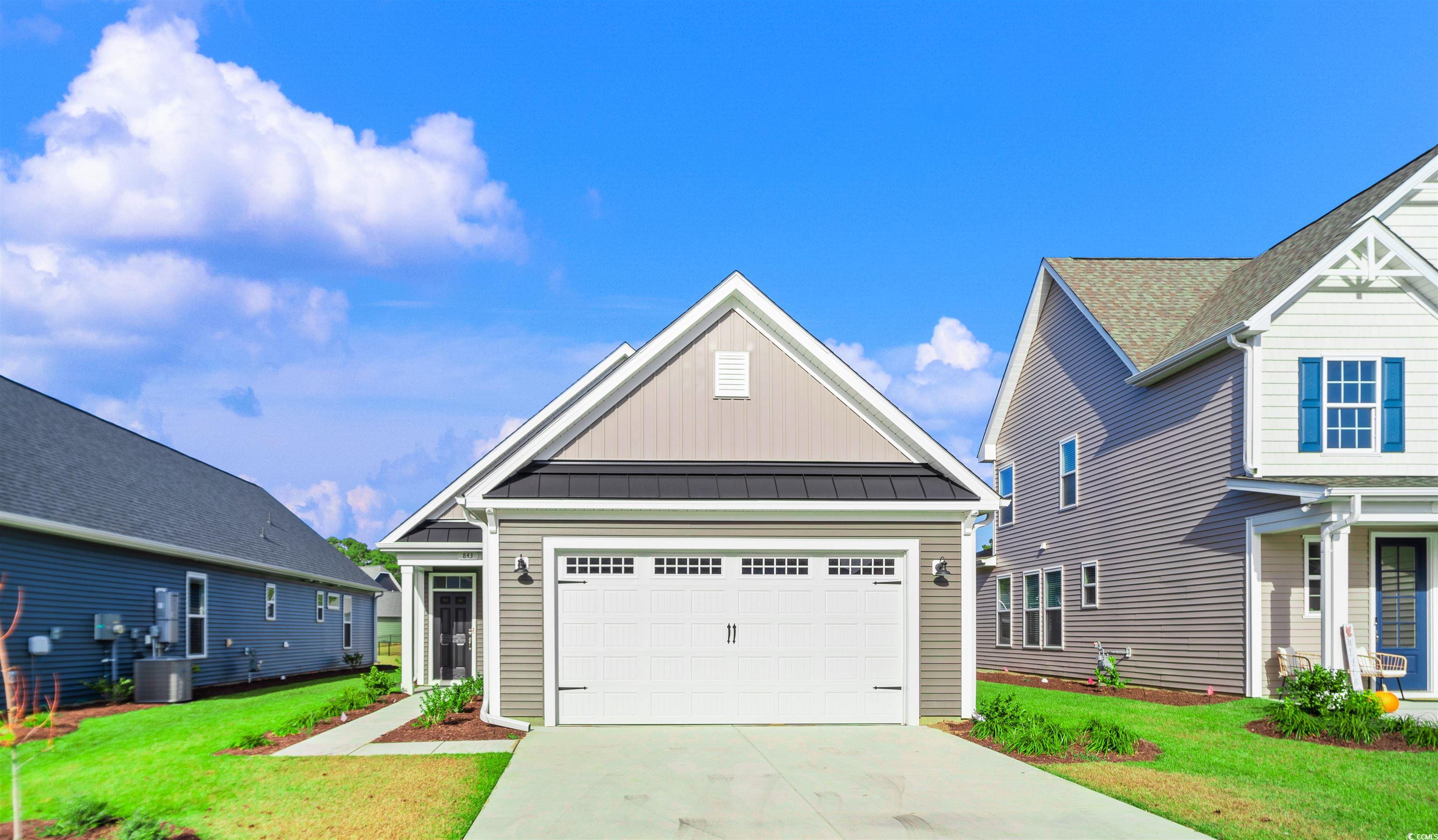 843 Cascade Loop Little River, SC 29566 - Photo 1 of 27 View of front of house with a front lawn, a garage