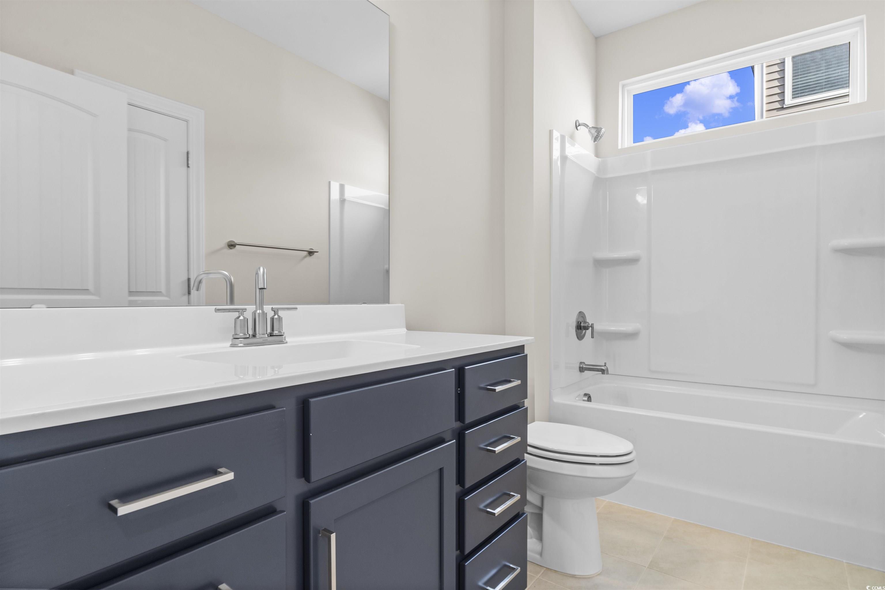 843 Cascade Loop Little River, SC 29566 - Photo 12 of 27 Full bathroom featuring tile patterned flooring, s