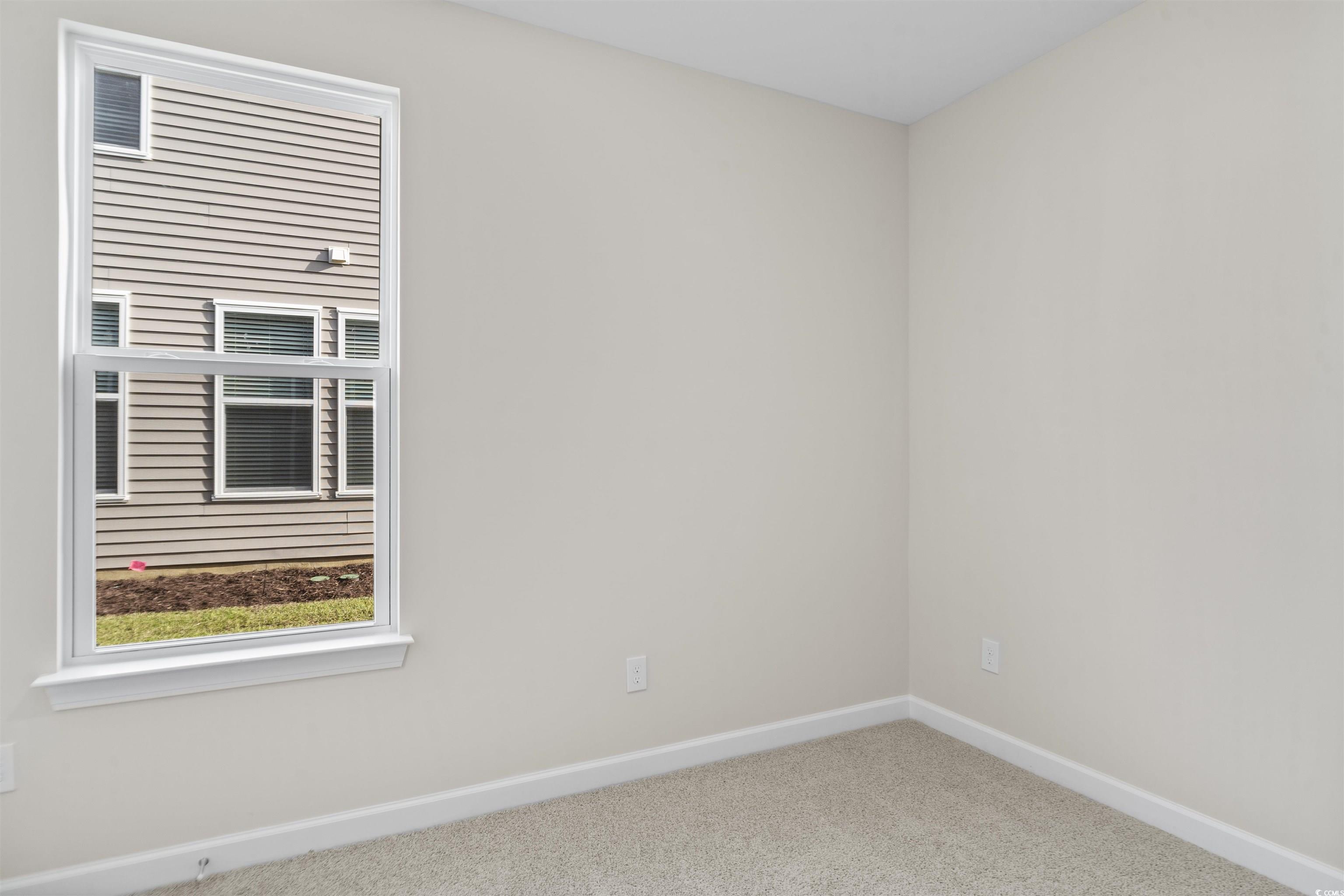 843 Cascade Loop Little River, SC 29566 - Photo 17 of 27 Spare room featuring carpet floors