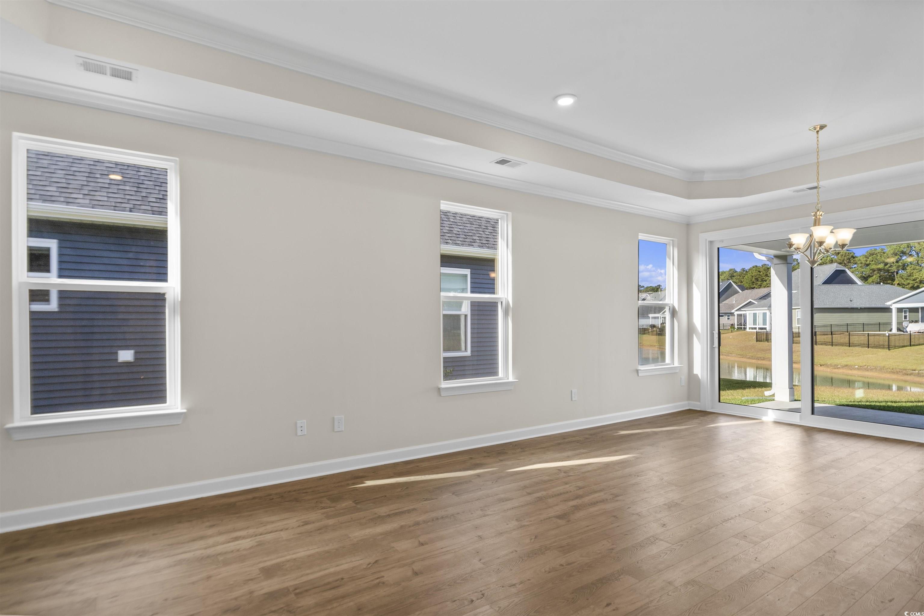 843 Cascade Loop Little River, SC 29566 - Photo 8 of 27 Unfurnished room featuring ornamental molding, a c