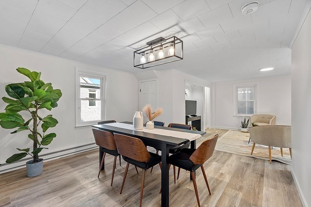 5 Montreal Street Worcester, MA 01604 - Photo 11 of 29 a view of a dining room with furniture window and wooden floor