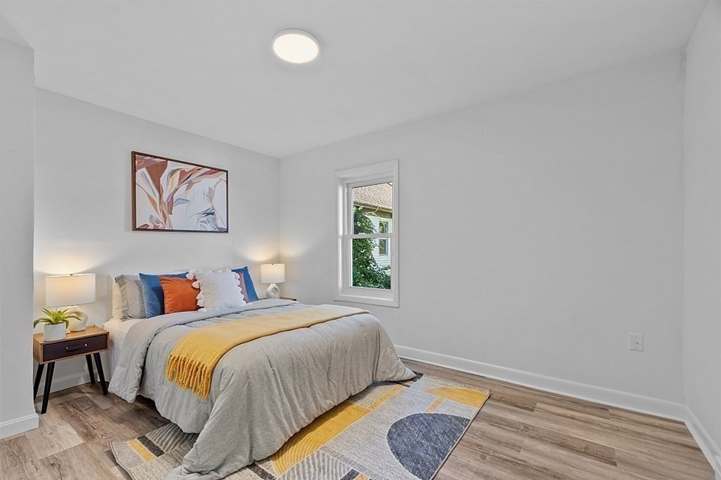 5 Montreal Street Worcester, MA 01604 - Photo 13 of 29 a bedroom with a bed and a window