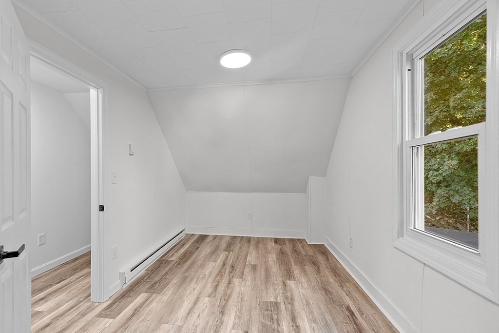 5 Montreal Street Worcester, MA 01604 - Photo 21 of 29 a view of room with window and hardwood floor