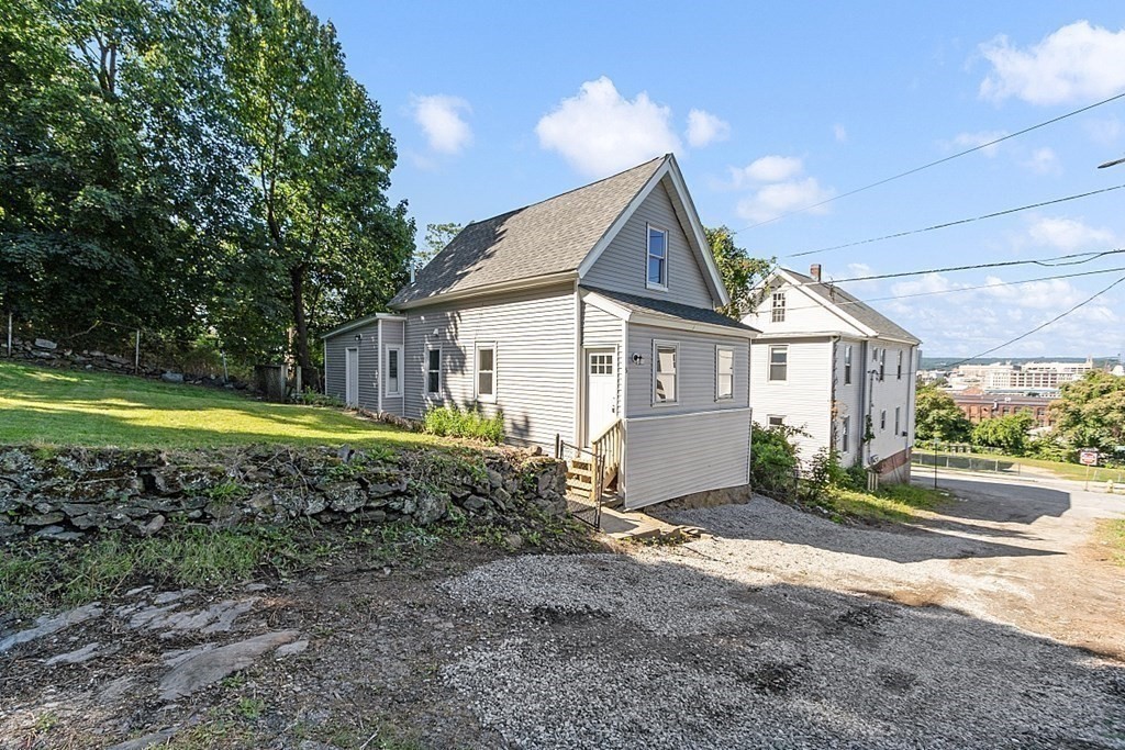 5 Montreal Street Worcester, MA 01604 - Photo 24 of 29 a view of a house with a yard and pathway