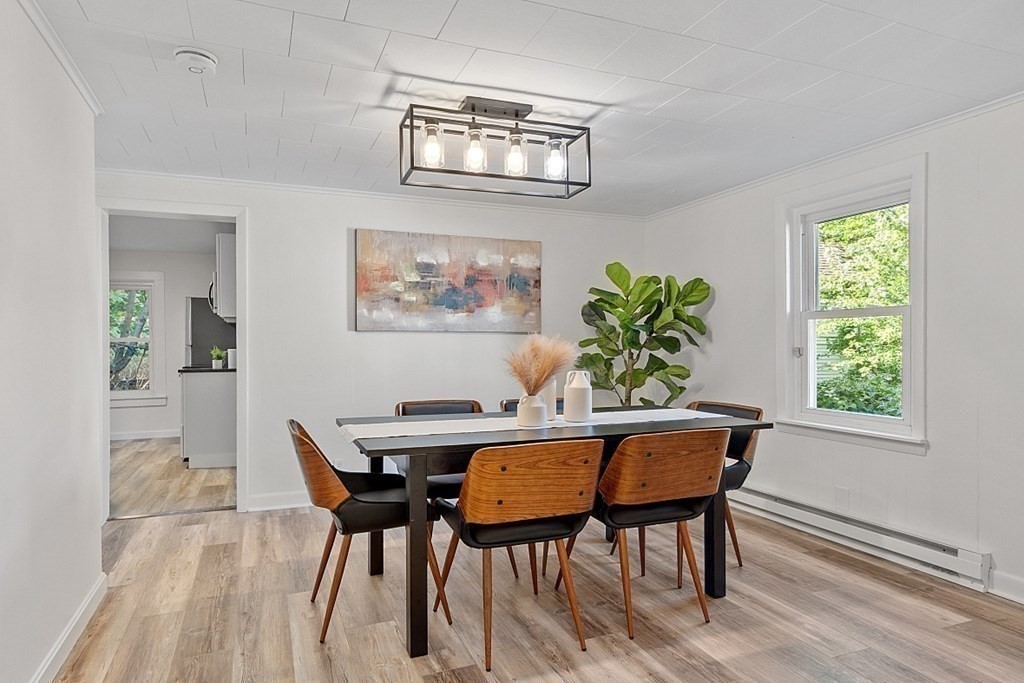 5 Montreal Street Worcester, MA 01604 - Photo 10 of 29 a view of a dining room with furniture and a potted plant