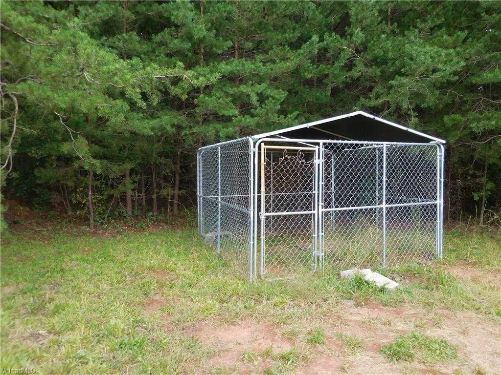 1049 Hickory Fork Road Walnut Cove, NC 27052 - Photo 20 of 24 A dog run for your fur baby.