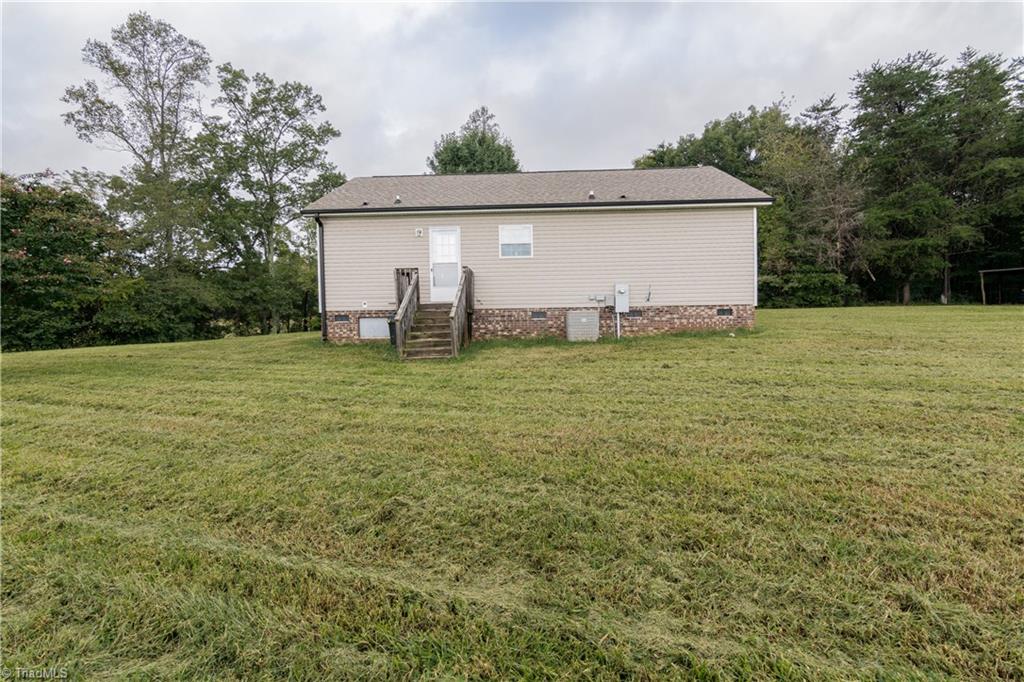 1049 Hickory Fork Road Walnut Cove, NC 27052 - Photo 22 of 24 Enjoy the privacy of the 1.62 acres that is cleared.