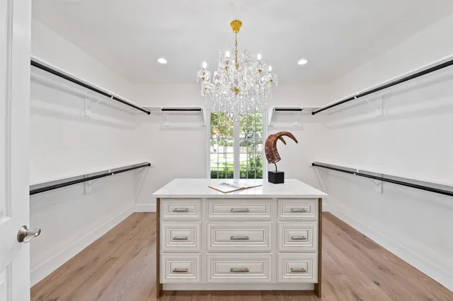 a bathroom with a shower toilet and sink