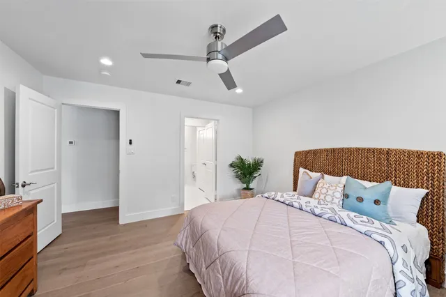 a bedroom with a bed furniture and a window