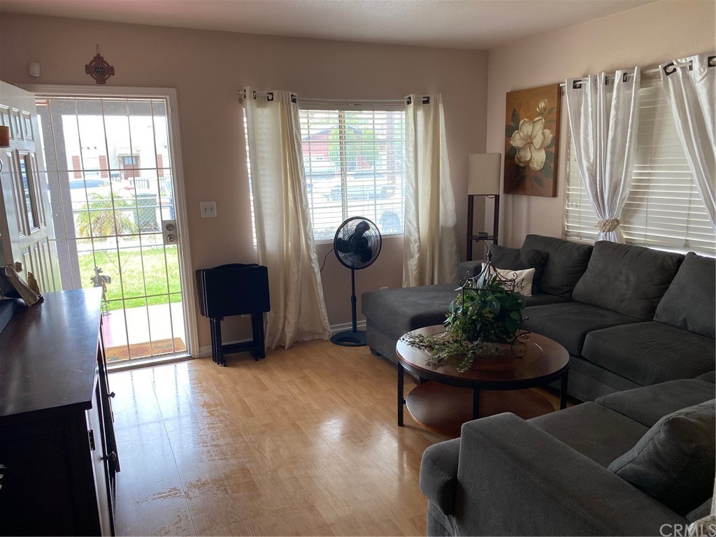 1136 Ohio Street Redlands, CA 92374 - Photo 1 of 1 a living room with furniture and a large window