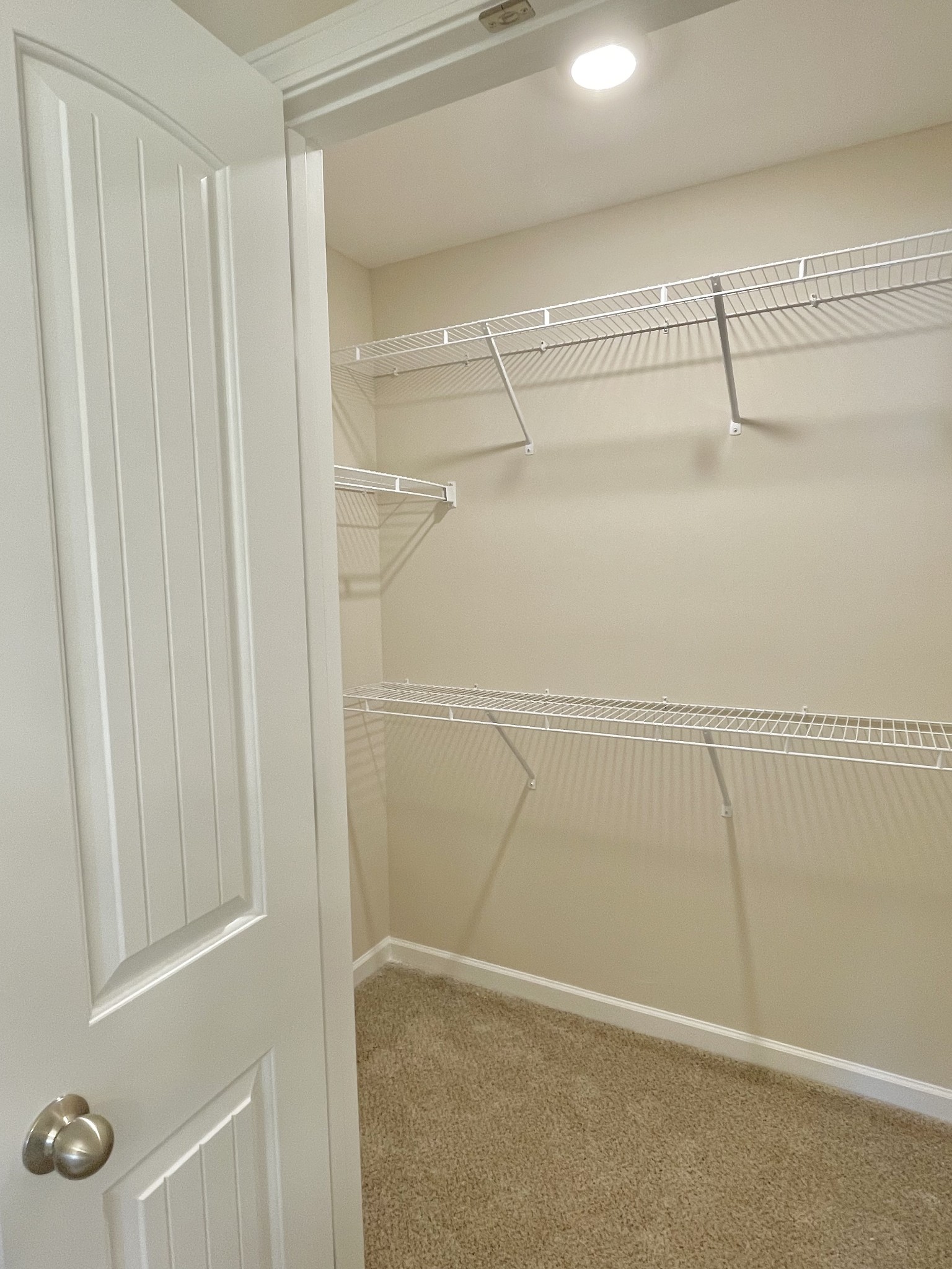125 Addi Street Pleasant View, TN 37146 - Photo 11 of 14 a view of a room with racks on the wall