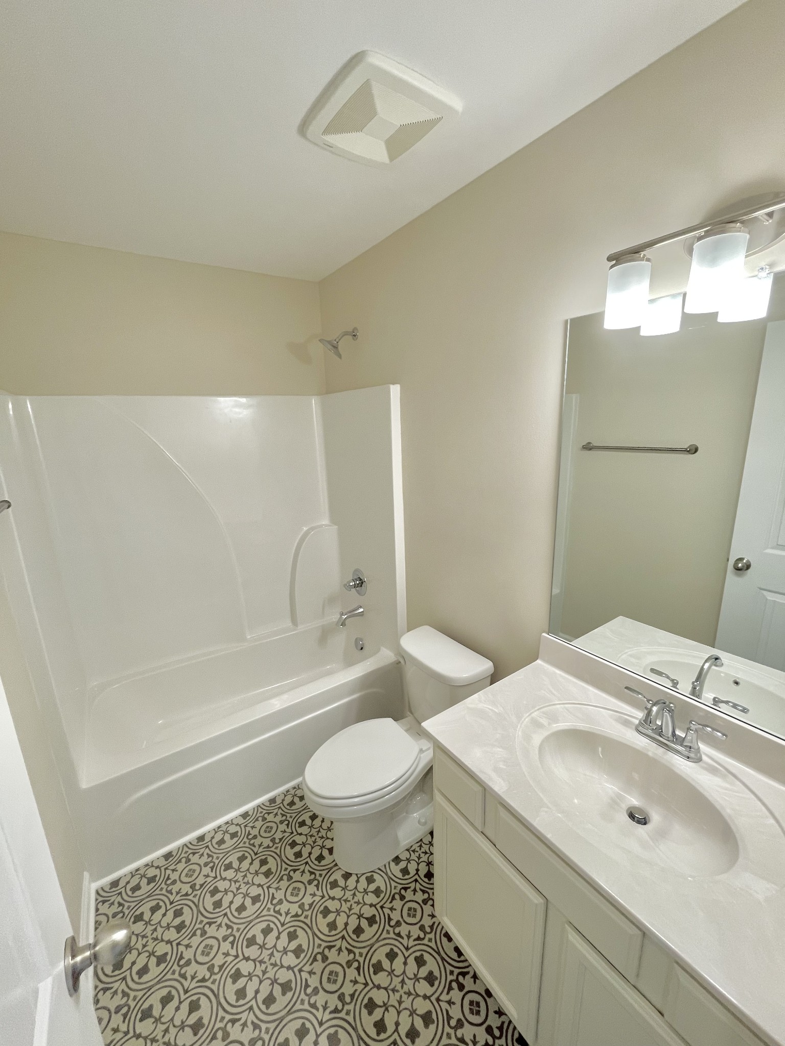 125 Addi Street Pleasant View, TN 37146 - Photo 13 of 14 a bathroom with a sink toilet vanity and shower