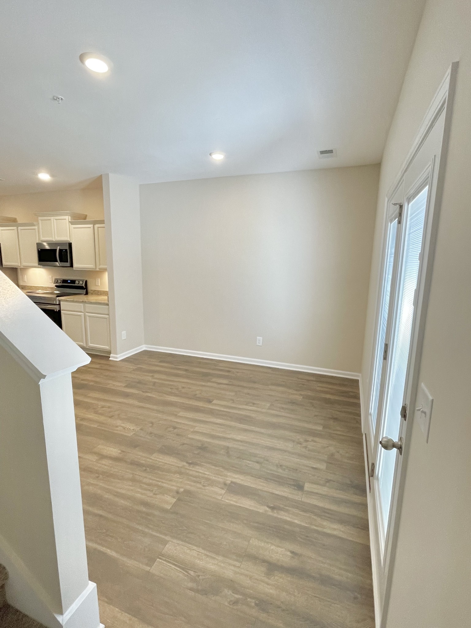 125 Addi Street Pleasant View, TN 37146 - Photo 7 of 14 a view of a kitchen cabinets and wooden floor
