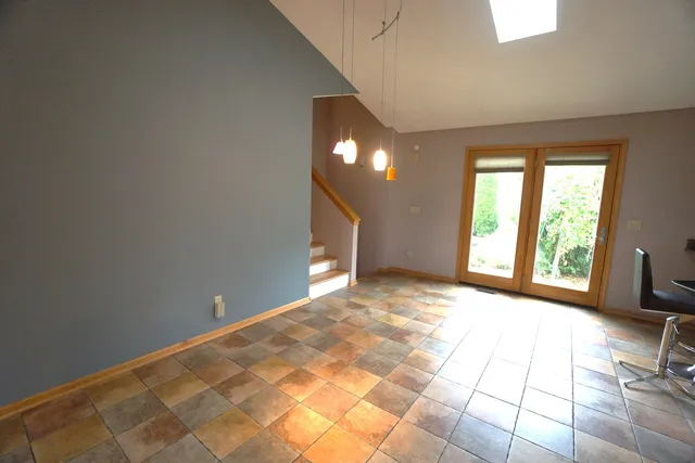 a view of an empty room and window