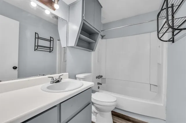 a view of a swimming pool with a yard