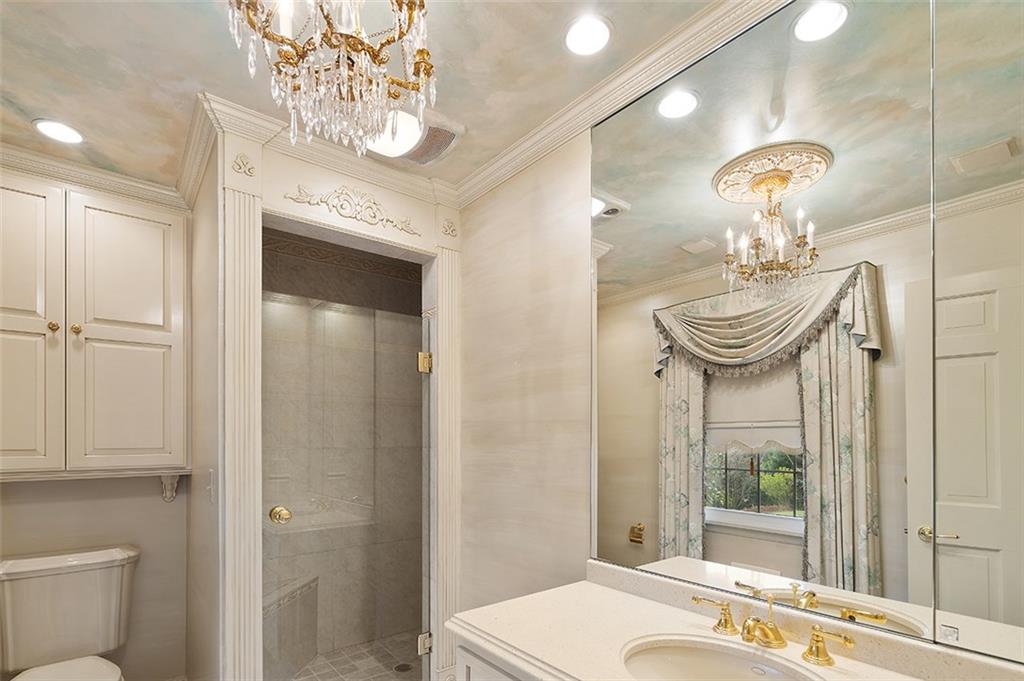 2676 Sunset Lane Allison Park, PA 15101 - Photo 14 of 25 The Luxurious Updated Master Bath includes a Custom Chandelier and Tile Shower.