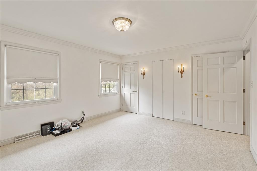 2676 Sunset Lane Allison Park, PA 15101 - Photo 15 of 25 Bedroom #2 Includes 3 closets and crown molding. The hall bath is next to the second bedroom.