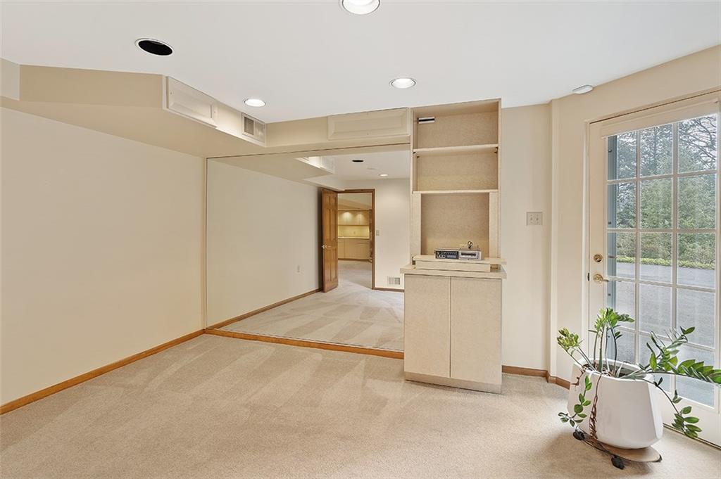 2676 Sunset Lane Allison Park, PA 15101 - Photo 20 of 25 This room can be used as a 4th bedroom/office/exercise room. Need a private entrance for an in-law suite?