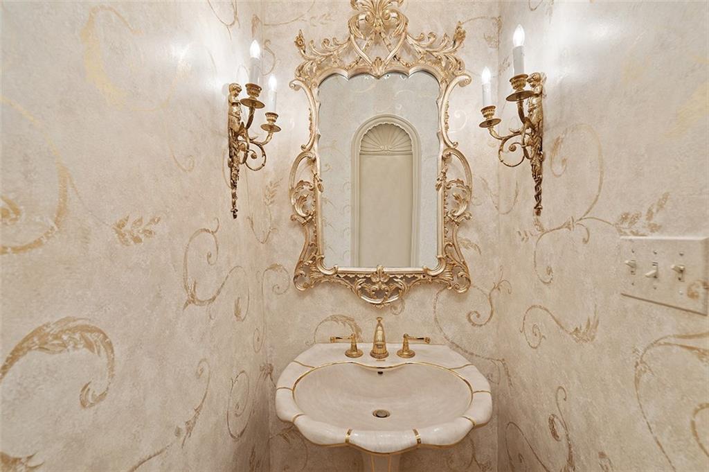 2676 Sunset Lane Allison Park, PA 15101 - Photo 4 of 25 The first floor powder room is off the foyer and is ornately decorated.