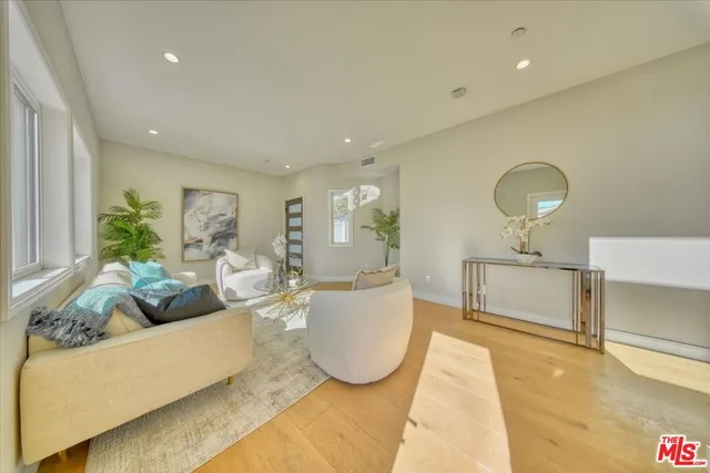 a view of a backyard with swimming pool