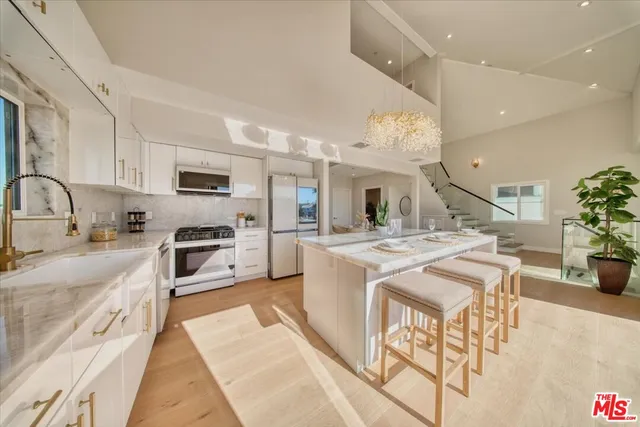 a view of balcony with wooden floor