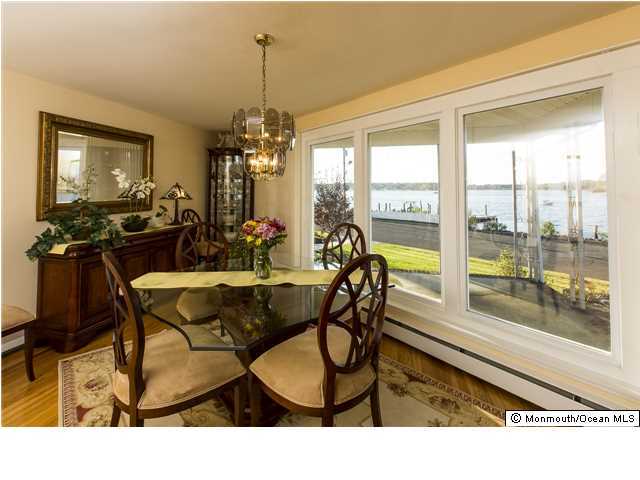 41 Albany Road Neptune Township, NJ 07753 - Photo 6 of 23 a dining room view with furniture and floor to ceiling windows