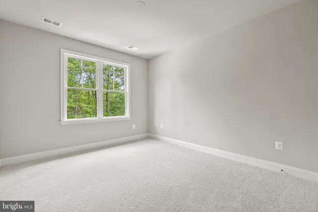 a bathroom with a sink double vanity and a mirror