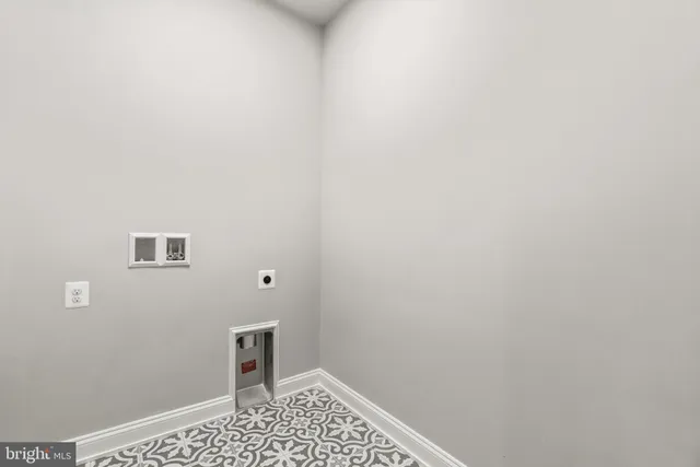 a bathroom with a sink toilet vanity and bathtub