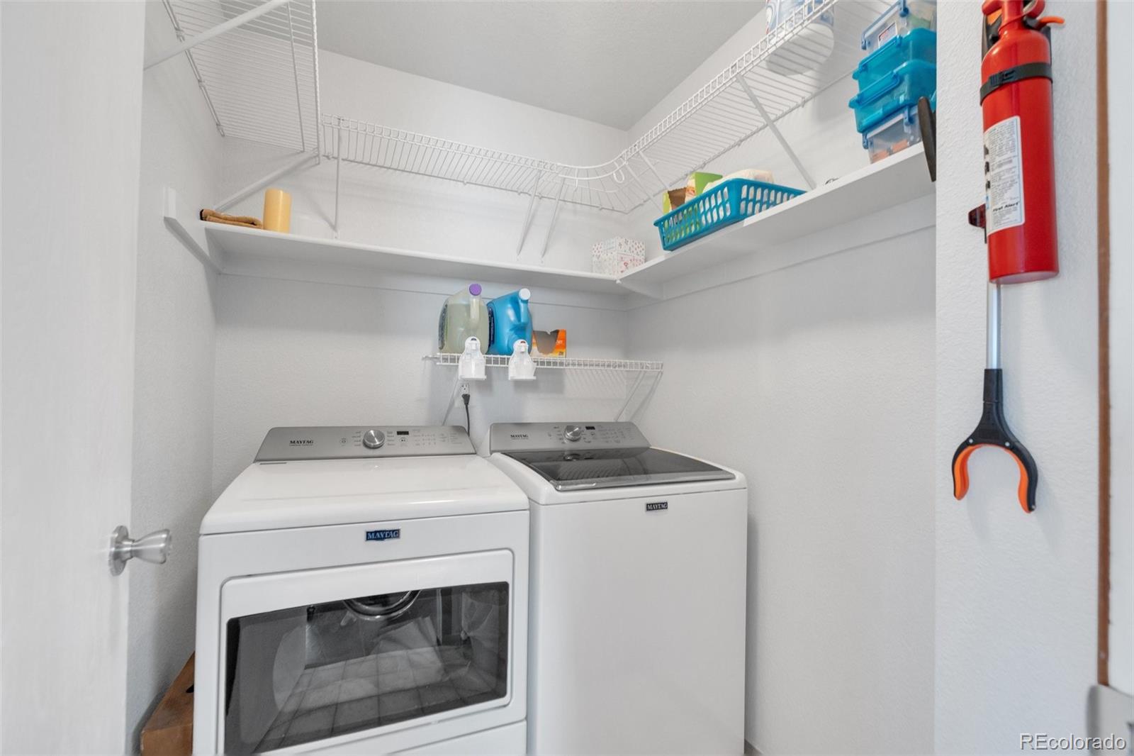 4320 Genoa Street Denver, CO 80249 - Photo 25 of 48 a utility room with dryer and washer