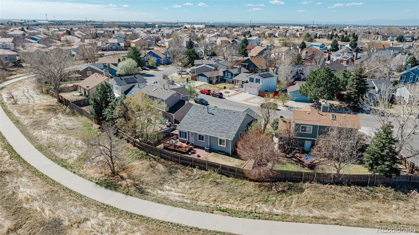 4320 Genoa Street Denver, CO 80249 - Photo 32 of 48 an aerial view of house with a yard