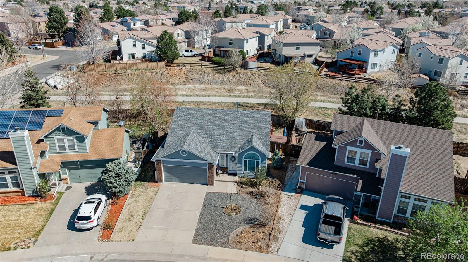 4320 Genoa Street Denver, CO 80249 - Photo 43 of 48 an aerial view of a house with outdoor space