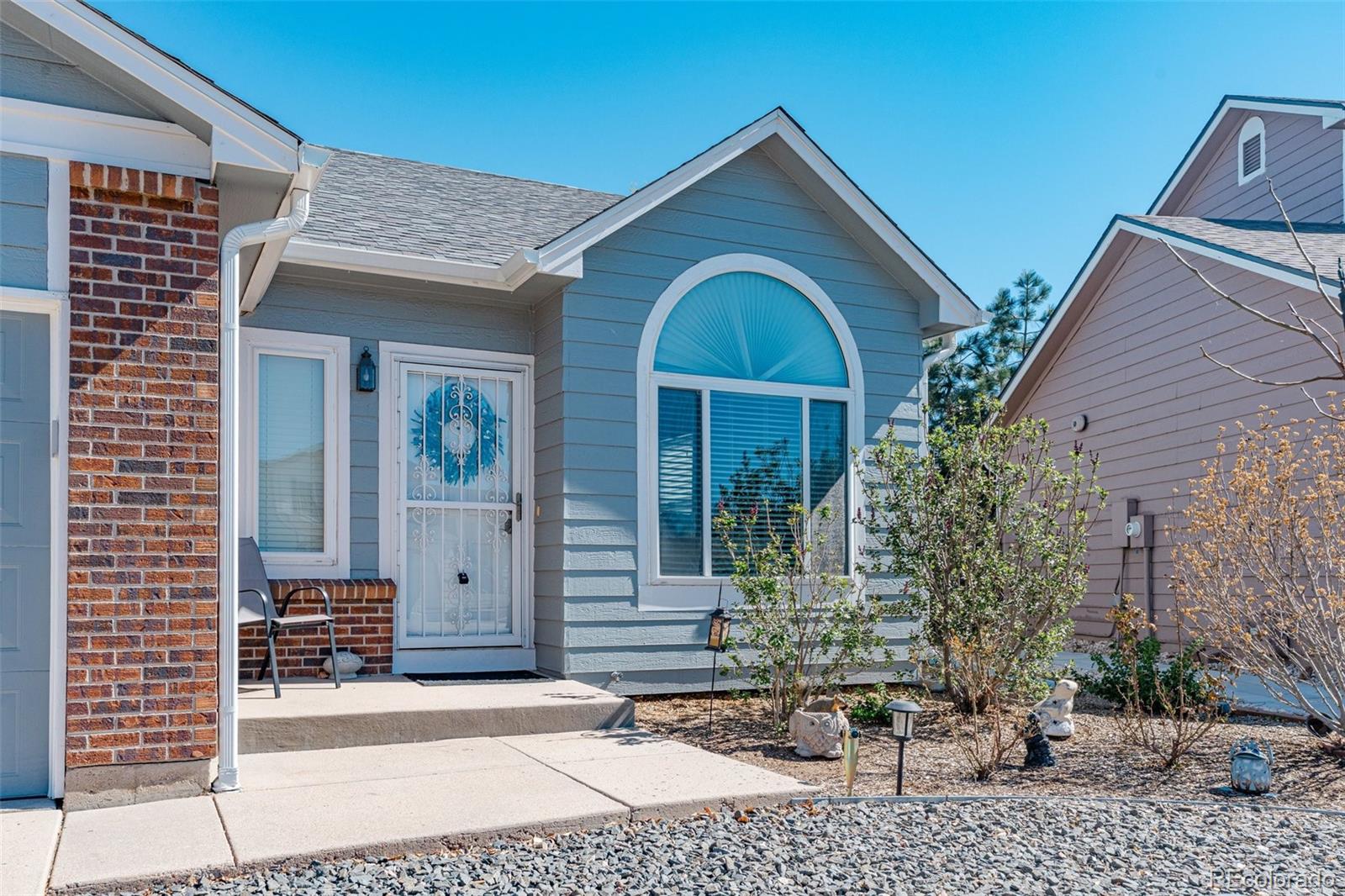 4320 Genoa Street Denver, CO 80249 - Photo 5 of 48 a front view of a house