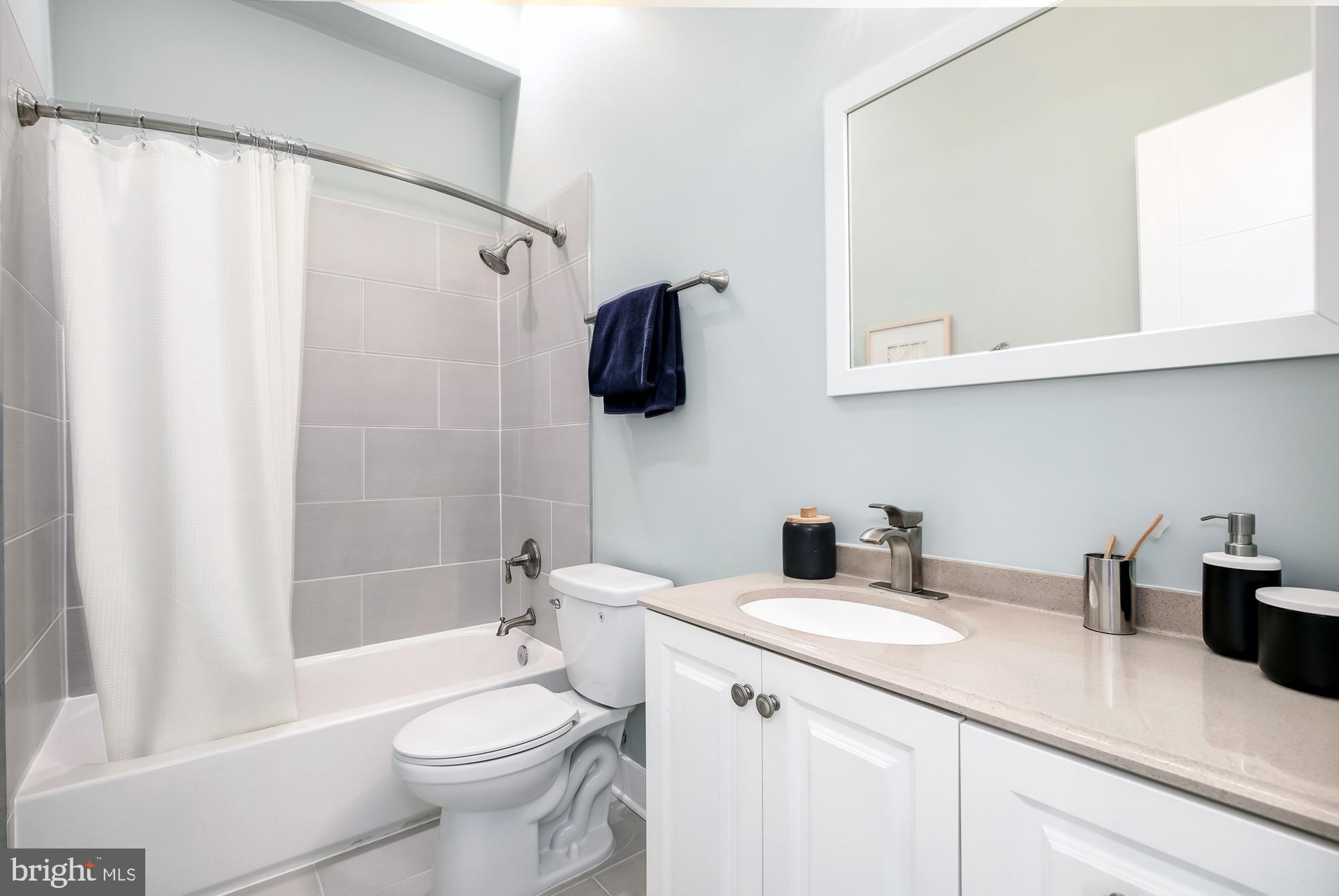 2000 D Street Northeast, Unit 5 Washington, DC 20002 - Photo 13 of 22 Hall Bath with Tub