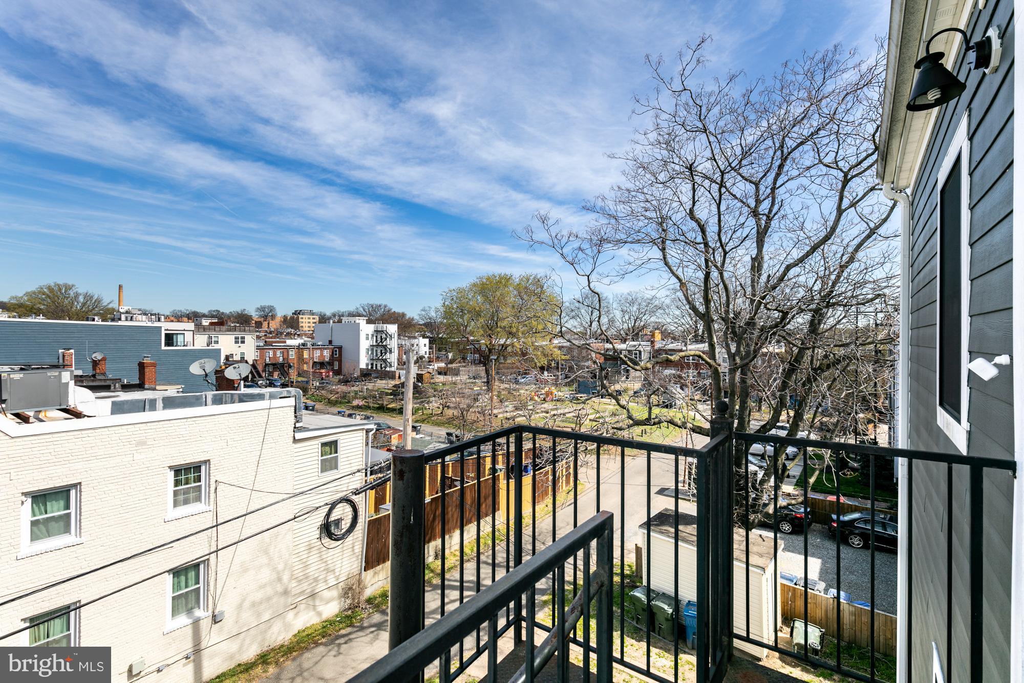 2000 D Street Northeast, Unit 5 Washington, DC 20002 - Photo 17 of 22 Back exit with view of community garden