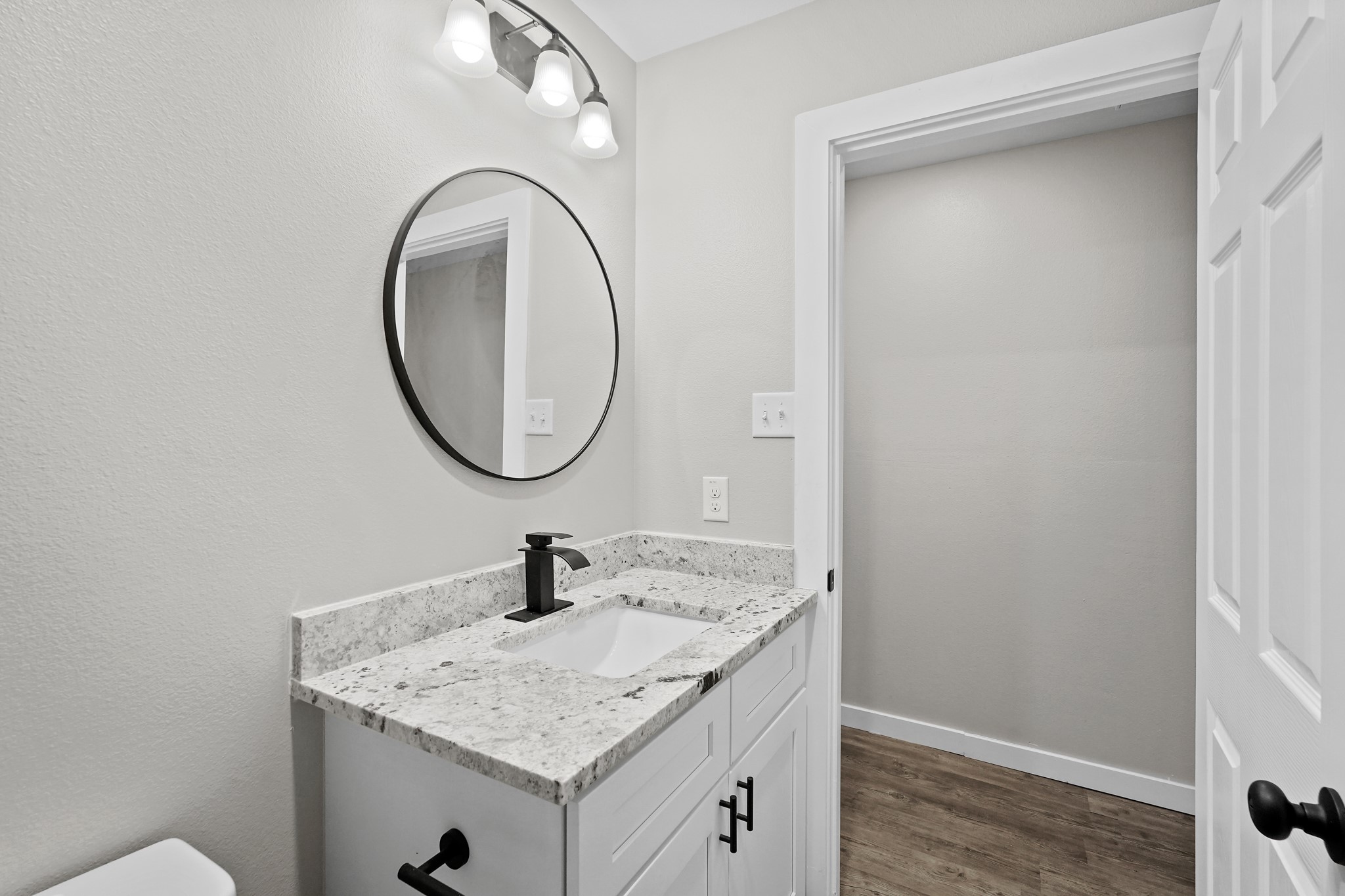 6121 Ridgemont Street Houston, TX 77087 - Photo 12 of 15 a bathroom with a sink and a mirror