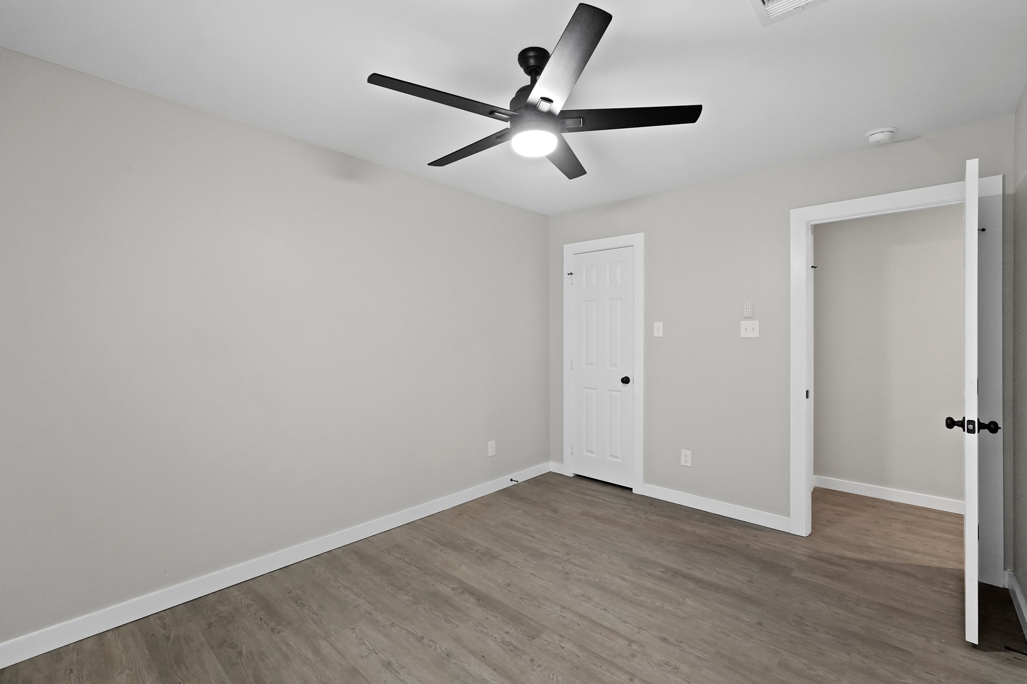 6121 Ridgemont Street Houston, TX 77087 - Photo 10 of 15 wooden floor in an empty room